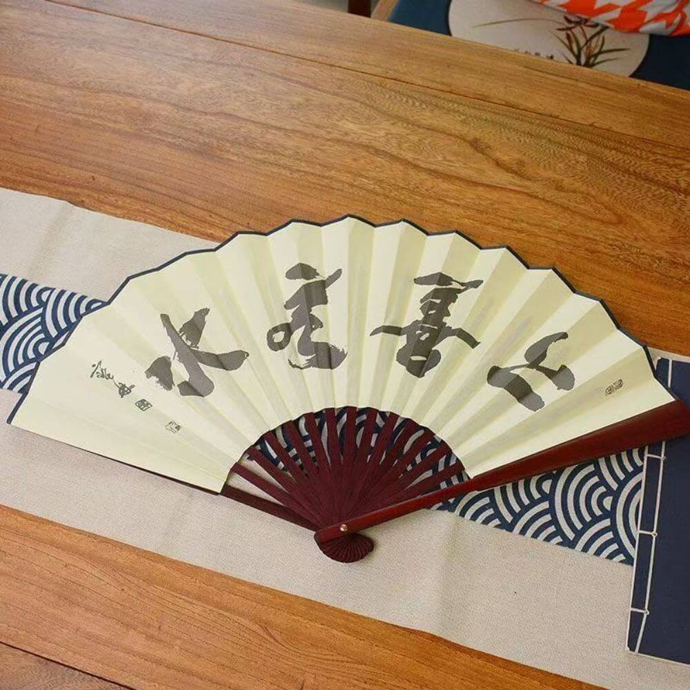 Shaolin Chinese Folding Fan With Bamboo Handle - Image 2